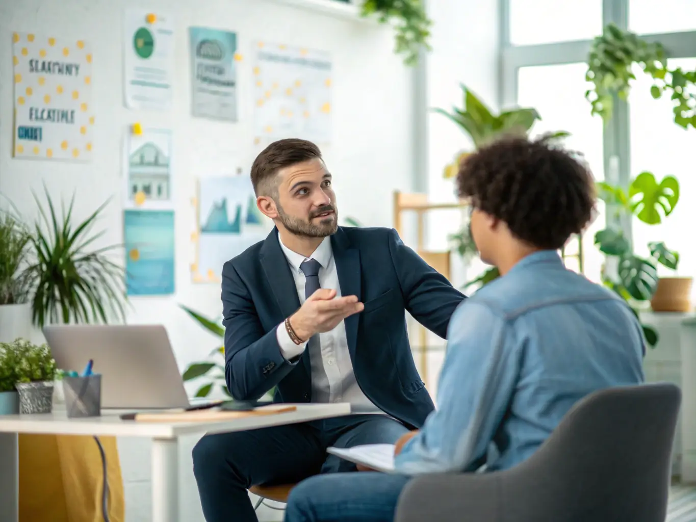 An image of a professional receiving guidance from a coach in a modern office setting, illustrating career advancement and support.