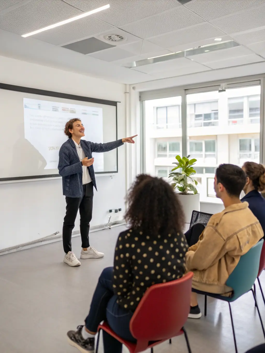 A person confidently presenting their ideas in a boardroom, showcasing improved communication and presentation skills.